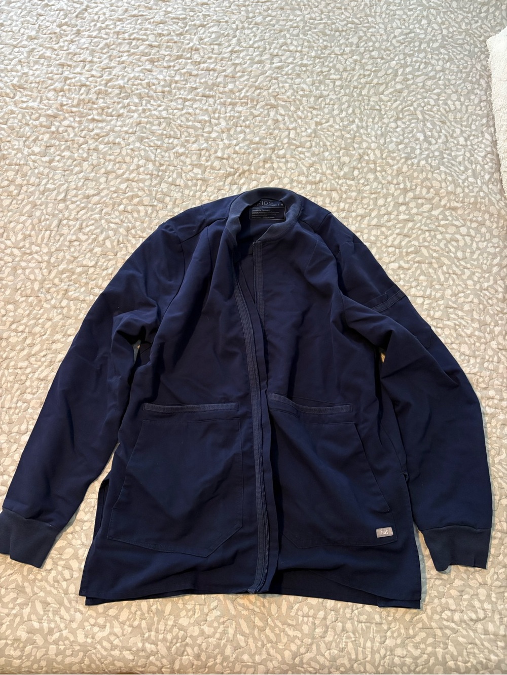 Figs Navy Zip-Front Scrub Jacket and Jaanuu Navy Scrub Pants
